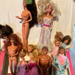 Vintage Ken and Barbie dolls and case